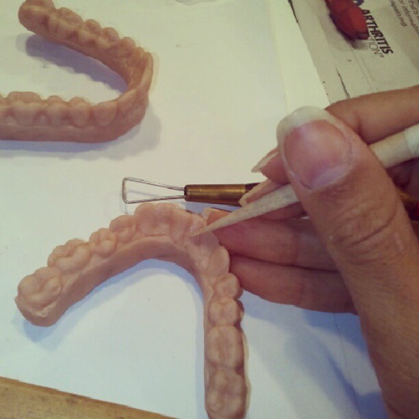 Carving process of teeth sculpture by Adesina