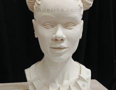 Photo of Artist Adesina Desi Sanchez's ceramic bust, Sister Panther, pre-glaze